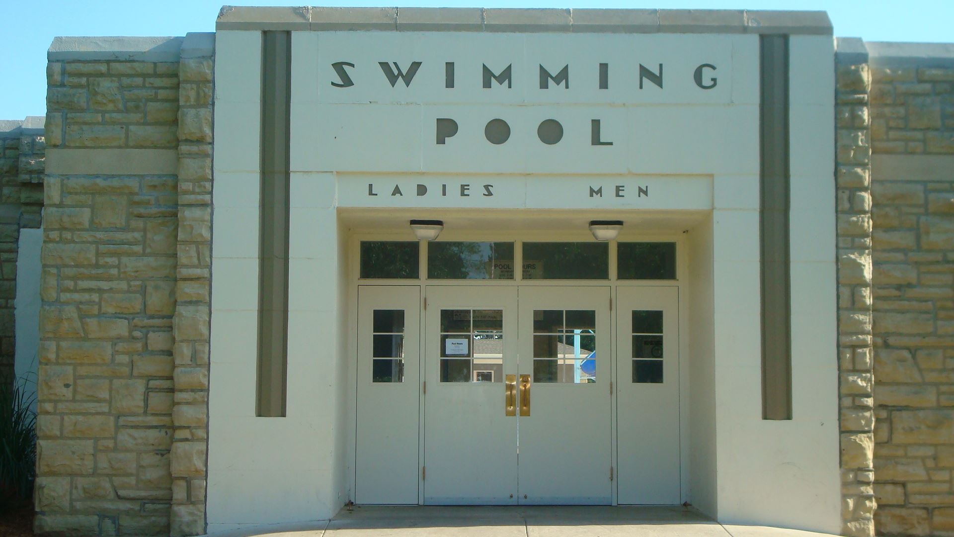 Close up picture of the front doors of the swimming pool